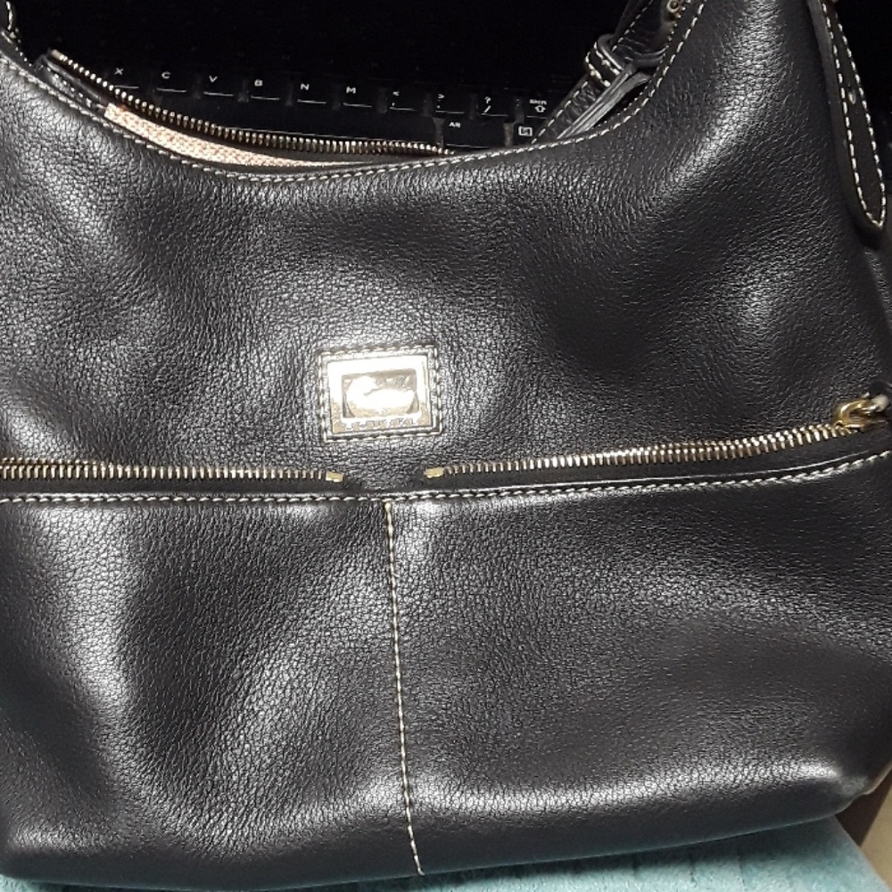 Dooney Bourke, includes blue cover bag